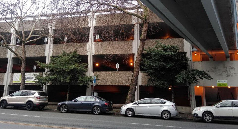 Cars parked along Mercer Street near Seattle Center