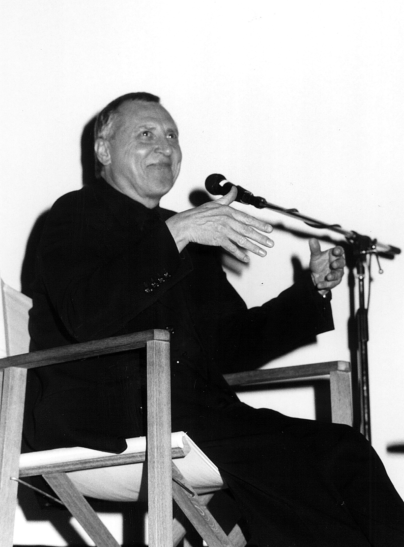 Director, Peter Greenaway, on stage discussing his film, The Pillow Book, which won him a Golden Space Needle Award for Best Director