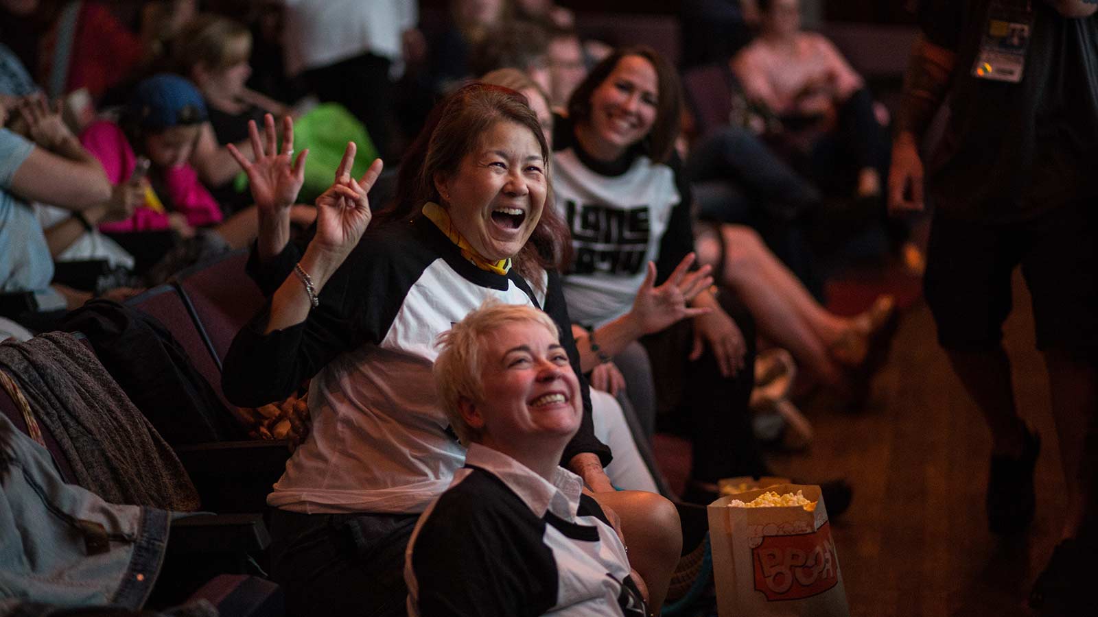 Excited Audience Members